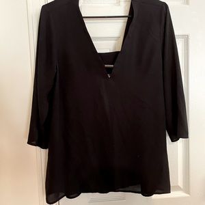 Classy, black 3-4 length going out top.